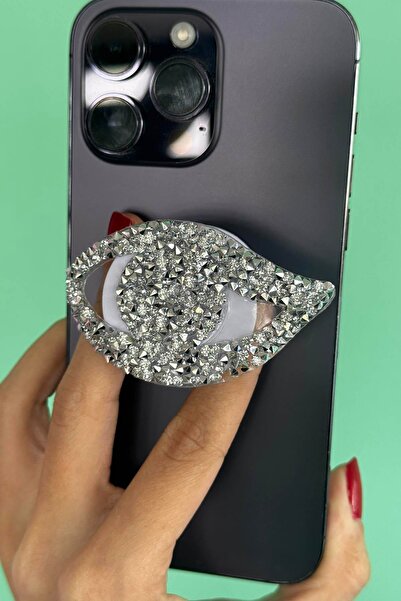 TAKIŞTIR Gümüş Renk Taş Detaylı Göz Figürlü 3D Telefon Tutacağı