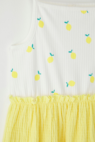 TRENDYOLKIDS فستان بناتي أصفر محبوك 100% قطن ملون بحزام صغير TKDSS25EL00073