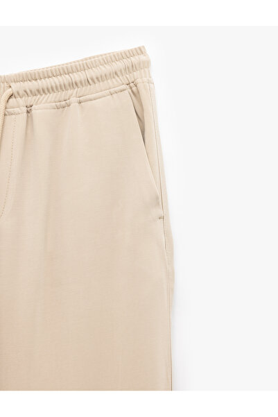 Koton Viscose Pocket Detailed Rayon Tapered Waist Lace-Up Trousers