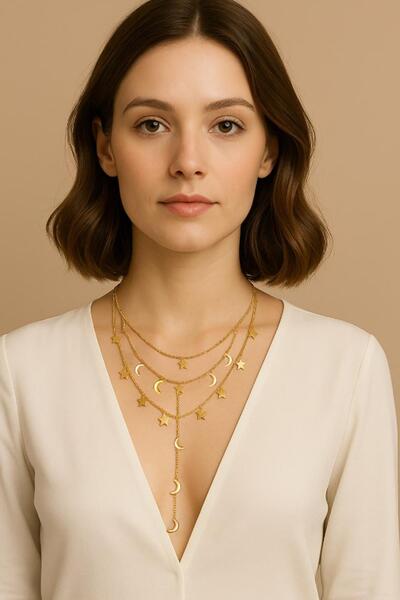 New Obsessions قلادة على شكل قمر ونجمة راقصة باللون الذهبي