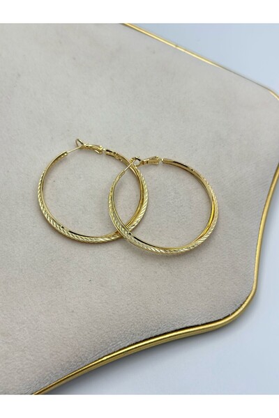 MyladyAccessoriess Orta Boy Sarmal Detay Halka Küpe (Çelik)