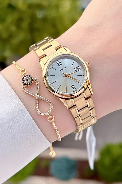 Casio Gold Color Women's Wristwatch with 24 Months Warranty