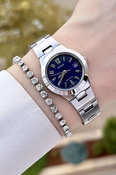Casio Women's Wristwatch with Navy Blue Cord and Metallic Color