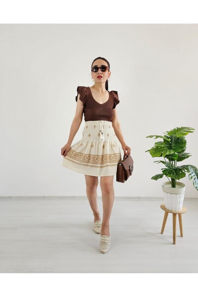 6 butik altı üstü butik Коротка лляна спідниця