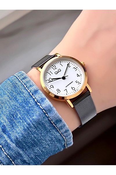Q&Q Black Wicker Cord Numeral Gold Case Women's Wristwatch