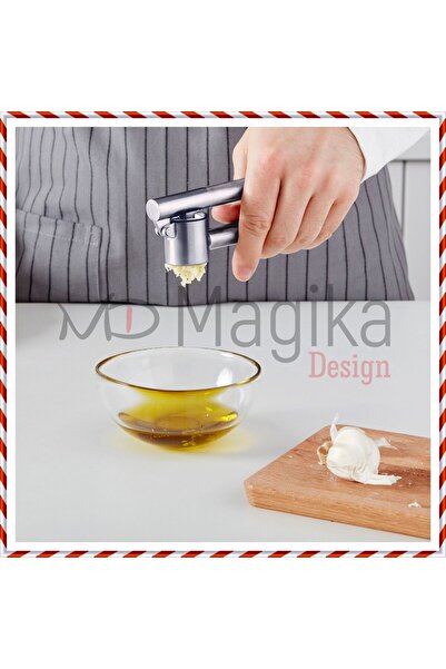 Magika Design هرس الثوم من الفولاذ المقاوم للصدأ كونسيس مقاس 16 سم