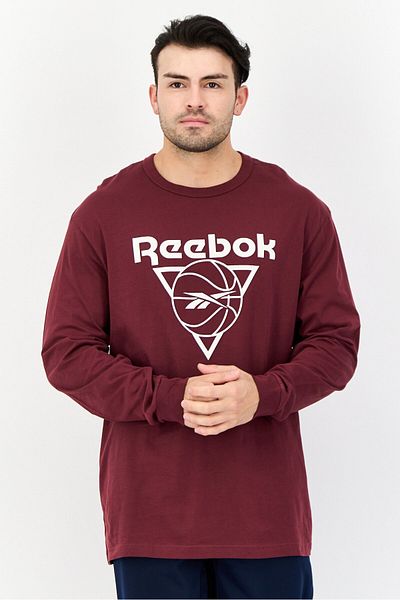 Reebok تي شيرت رجالي رياضي بأكمام طويلة مناسب للأنشطة الخارجية، لون عنابي