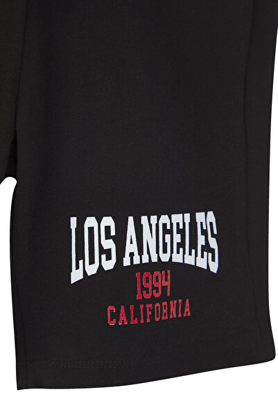 TRENDYOLKIDS Černo-khaki sloganové pletené šortky a bermudy TKDSS25SR00004