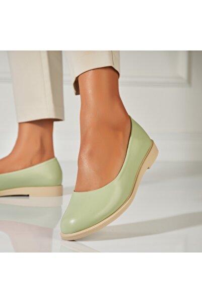 Joana Balerini dama Piele Ecologica Verde Jalecia