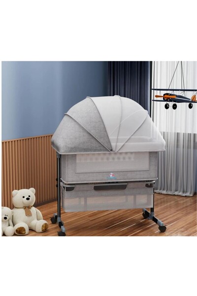 Mini Baby سرير اطفال و رضع هزاز مزود بناموسية وبشكل انيق بالإضافة الى منطفة ت...