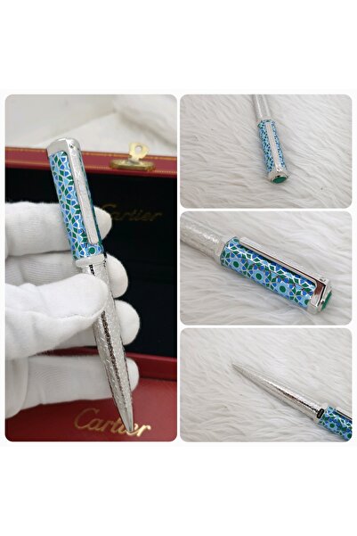 Cartier A luxurious Cartier pen with a design and accessories