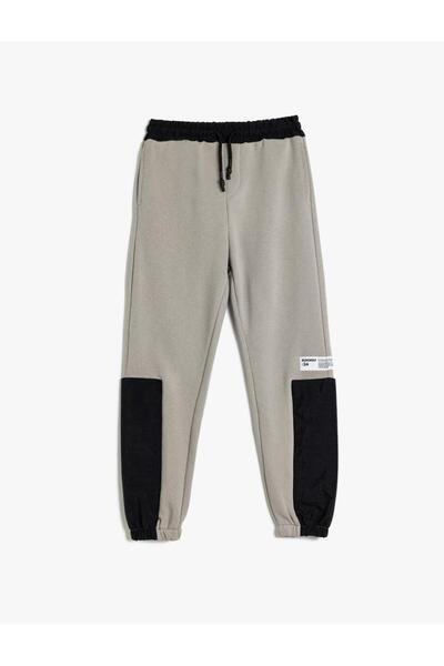 Koton Tepláky Jogger v pase s barevnou blokovanou kapsou