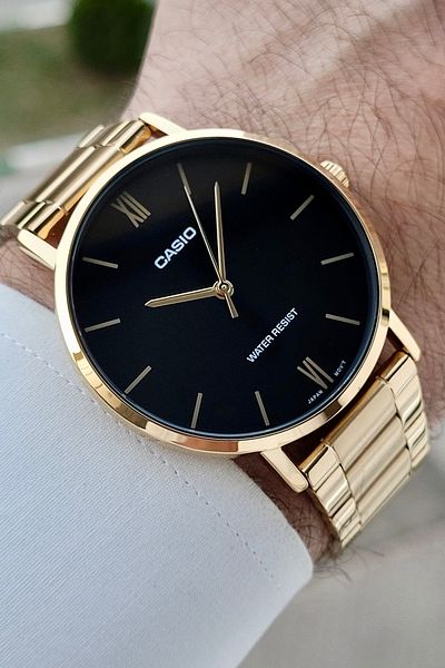 Casio Men's Wristwatch with Black Cord Gold Color 2 Years Warranty