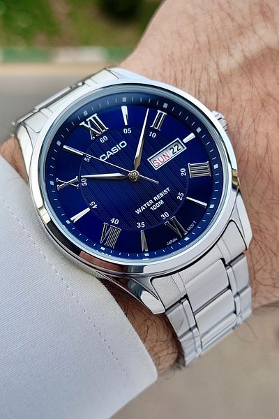 Casio Men's Wristwatch with Dark Blue Cord and Metallic Color