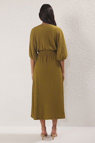 Trendyol Collection Oil Green Textured V-Neck Sleeve Waist Gipped Maxi Dress Twoss25El00830