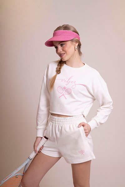 AFLOOW Delicate Women's Ecru Sports Shorts - Relaxed Fit, Stylish Tennis Racquet Detail