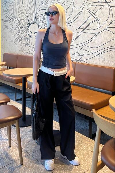 Madmext Magas derekú és laza szabású fekete széles szárú nadrág - MG2120