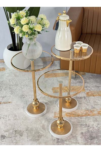 Living A set of 3-piece glass service tables with a white steel base