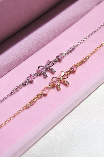 Harlofia Jewelry Pink Heart Bracelet with Steel Ribbon Detail