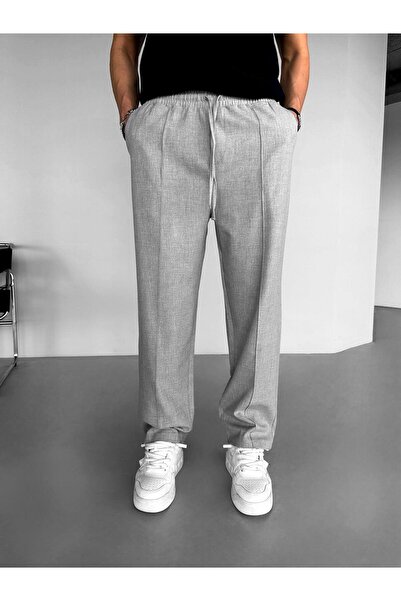 ablukaonline Šedé pánské pytlovité kalhoty - elastický pas