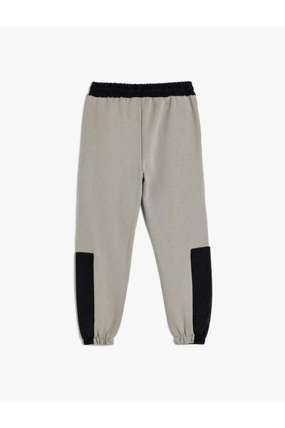 Koton Tepláky Jogger v pase s barevnou blokovanou kapsou