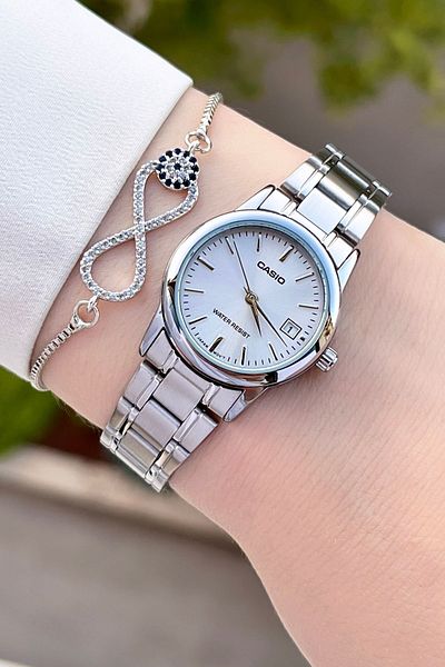 Casio Metallic Color Women's Wristwatch with 24 Months Warranty