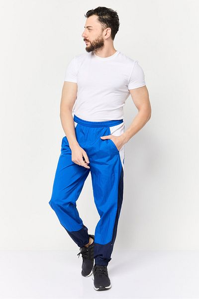 Reebok Men Sportswear Fit Brand Logo Training Track Pants, Blue