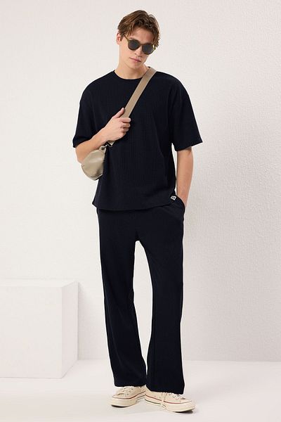 Trendyol Collection Indigofarbenes Oversize-/Wide-Cut-Trainingsanzug-Set mit Struktur TMNSS25EM00010