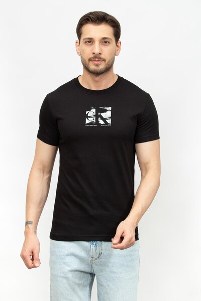 Calvin Klein تي شيرت رجالي من القطن بأكمام قصيرة ورقبة دائرية باللون الأسود J...