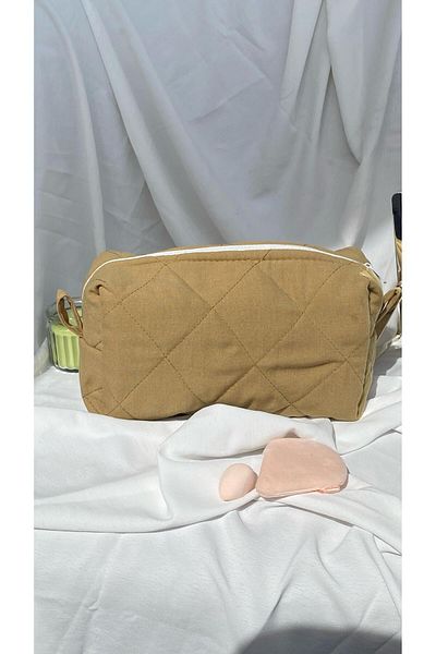 cosybag. Ватирана чантичка за грим от плат с шарки, кафява