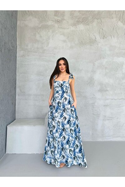 REELMODA Kadın Mavi Geniş Askılı Omuzda Bağlamalı Cepli Rahat Kalıp Pamuklu Desenli Yazlık Elbise