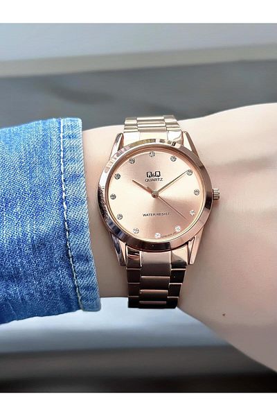 Q&Q Women's Metal Cord Rose Color Stone Dial Wristwatch