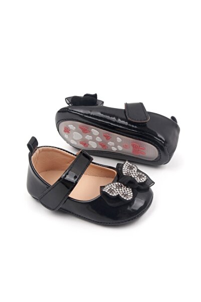 Bebelul Black patent leather shoes with rhinestone bow