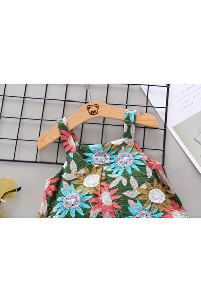 Superbaby Costume for girls - Colorful flowers on a green background