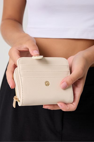 Fossil Bézs színű női kuplung kézitáska 06FS25Y09