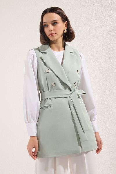 Trendyol Modest Mintgrüne, gefütterte, gewebte Weste mit Taillenband und detailliertem Detail TCTSS23YL00029