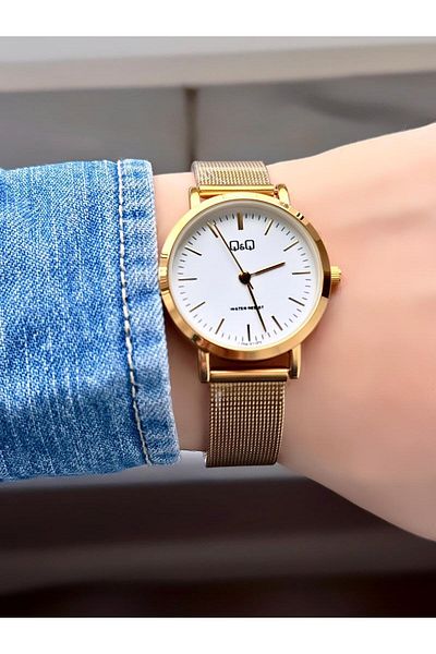 Q&Q Women's Wristwatch with Wicker Band Gold Color