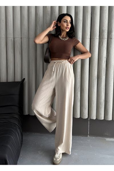 modazoom Cremefarbene Palazzo-Hose aus Lycra mit Falten und hoher Taille für Damen