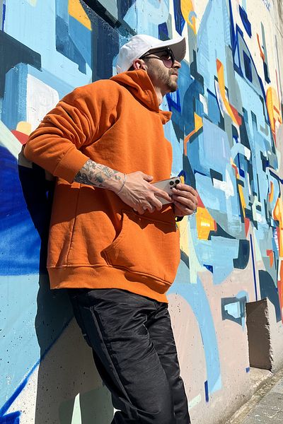 KonforA Unisex Orange 3 Thread Raster Sweatshirt Hoodie with Stack on It