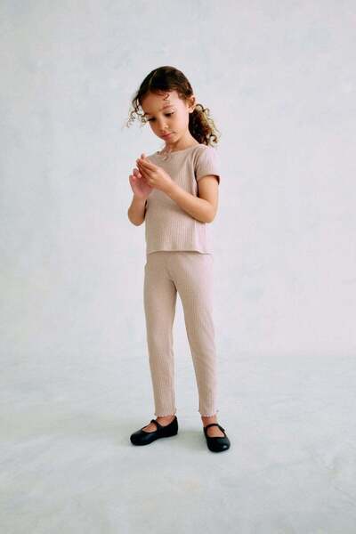 H&M بنطال قطني مضلع