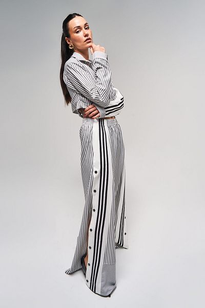 its basic Women's Black Striped Color Side Button Palazzo Fit Loose Cut Design Trousers