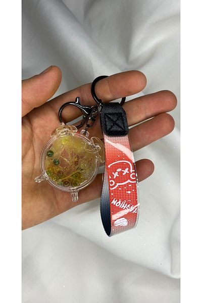 nss sky rock Alarm Clock Shaped Keychain and Bag Accessory Full of Liquid and Ornaments
