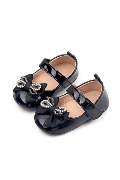 Bebelul Black patent leather shoes with rhinestone bow