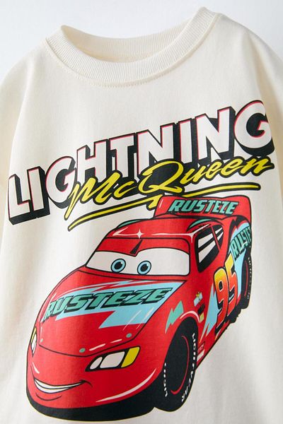 Magu Boys Cotton Cream Lightning Mcqueen Printed T-Shirt and Black Shorts Set
