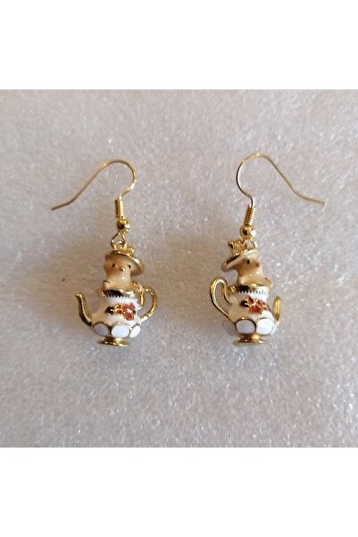 Butik Tülin Otantik el yapımı altın renkli emaye çaydanlık içindeki minik far...