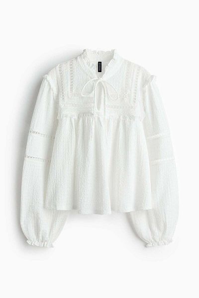 H&M بلوزة كبيرة الحجم مزينة بالكشكشة