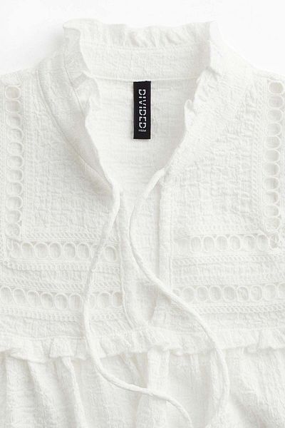 H&M بلوزة كبيرة الحجم مزينة بالكشكشة