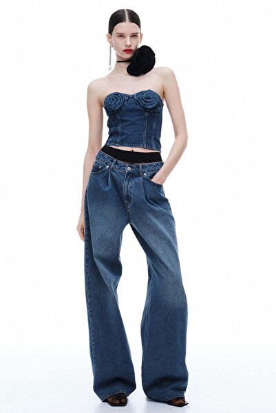 H&M صدرية من الدينيم مزينة بالورود