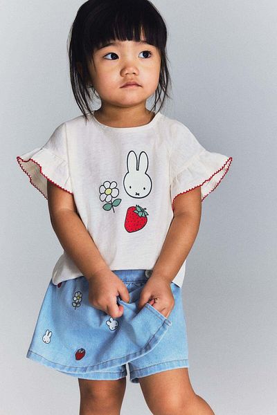 H&M تنورة جينز بتفاصيل تطريز