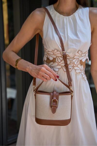 Madamra Dámská taška do ruky a přes rameno v moderním designu s přezkou v plátěném provedení